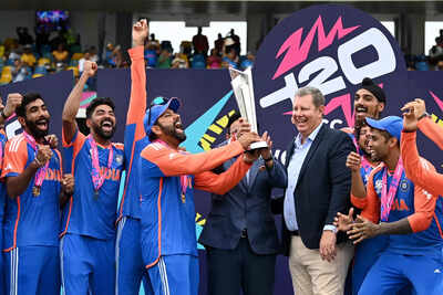Rohit Sharma proudly hoists the T20 World Cup trophy.