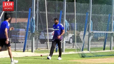 Jasprit Bumrah preparing to bowl, showing focus